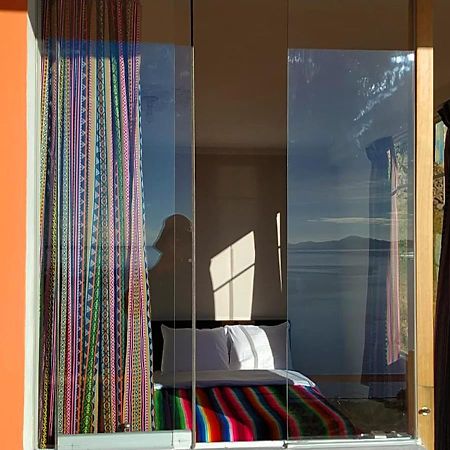 Tikawasi Homestay Comunidad Pueblo Isla Amantani José Luis Ocosuyo Bagian luar foto
