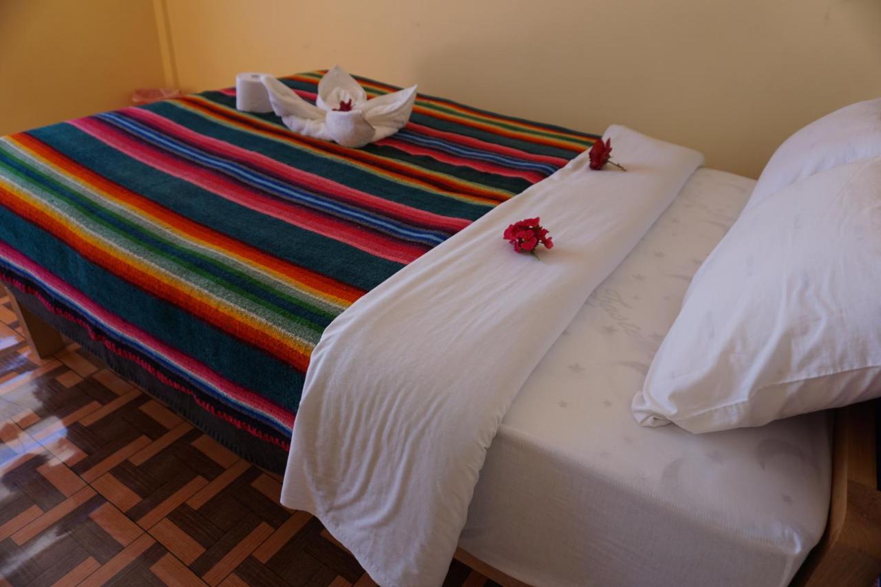 Tikawasi Homestay Comunidad Pueblo Isla Amantani José Luis Ocosuyo Bagian luar foto